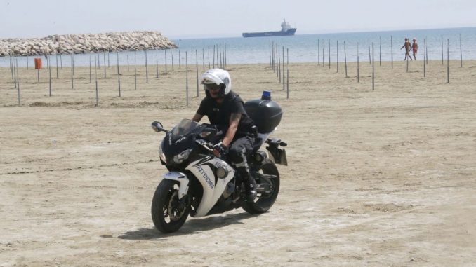 police-on-beach-960x571